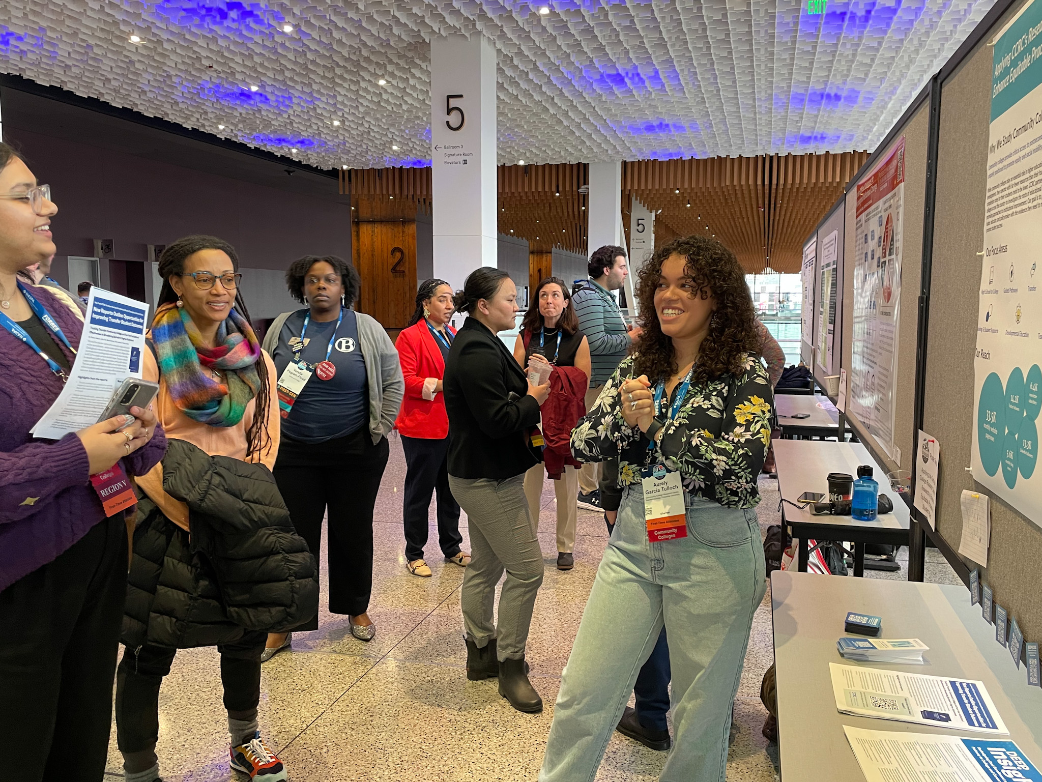 Aurely Garcia Tulloch sharing information at a poster session