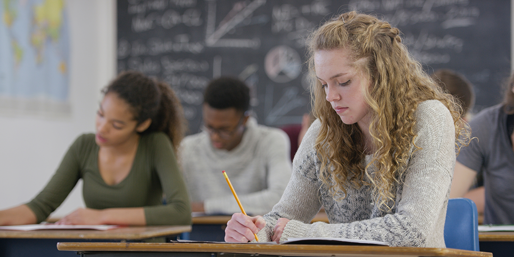 Students write in class 