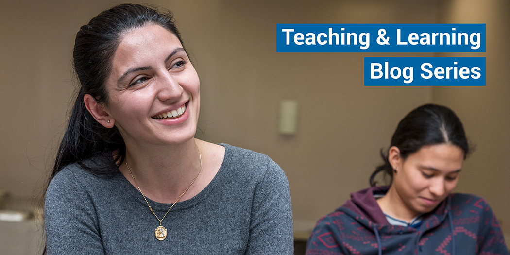 Two students smile in class at Laguardia Community College in New York