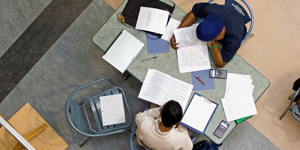 An overhead shot of students studying math together