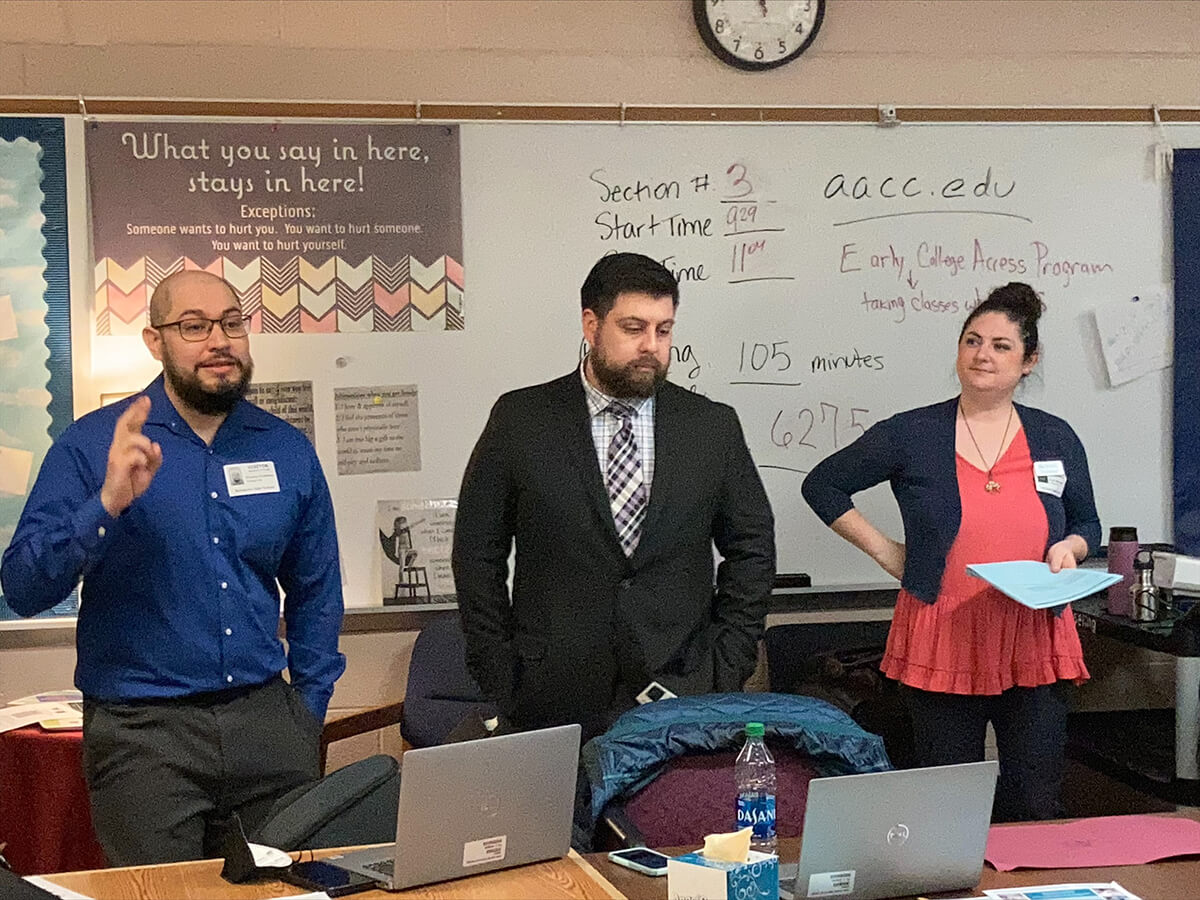 Pictured from left to right: Ricardo Quinteros (AACC admissions officer), Pablo Hernandez (AACC financial aid assistant director), and Dana Marron (English language learning-adult education director) at the special registration event held in May 2022 at Annapolis High School