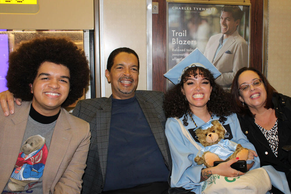 Aurely Garcia Tulloch and her family leaving Teachers College graduation ceremony