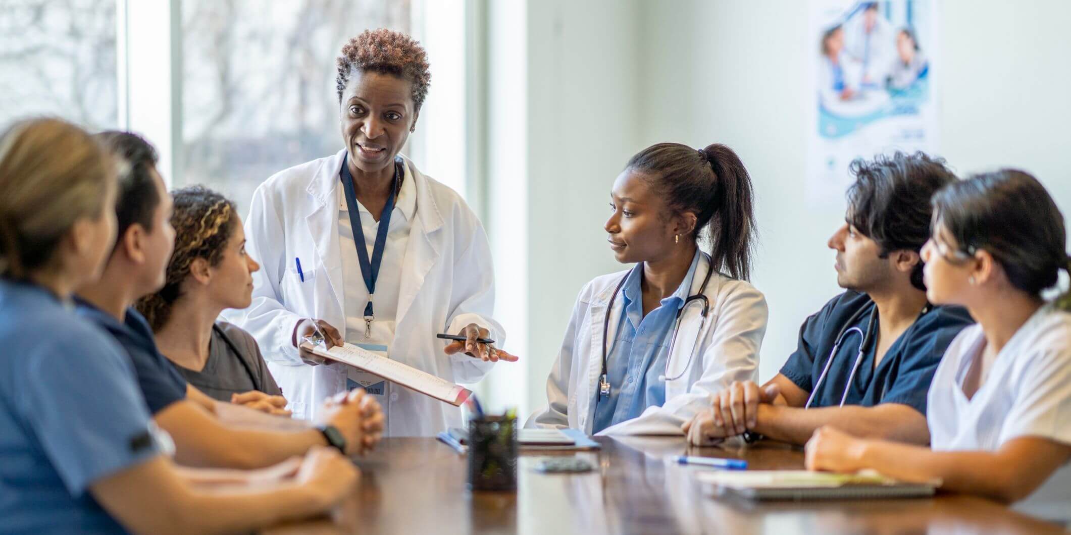 Medical students sitting around a table